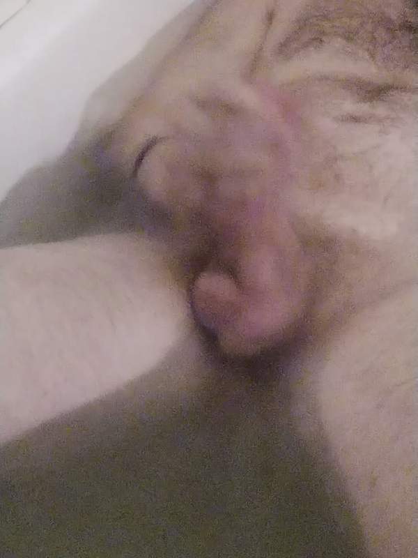 Amateur masturbates with large penis